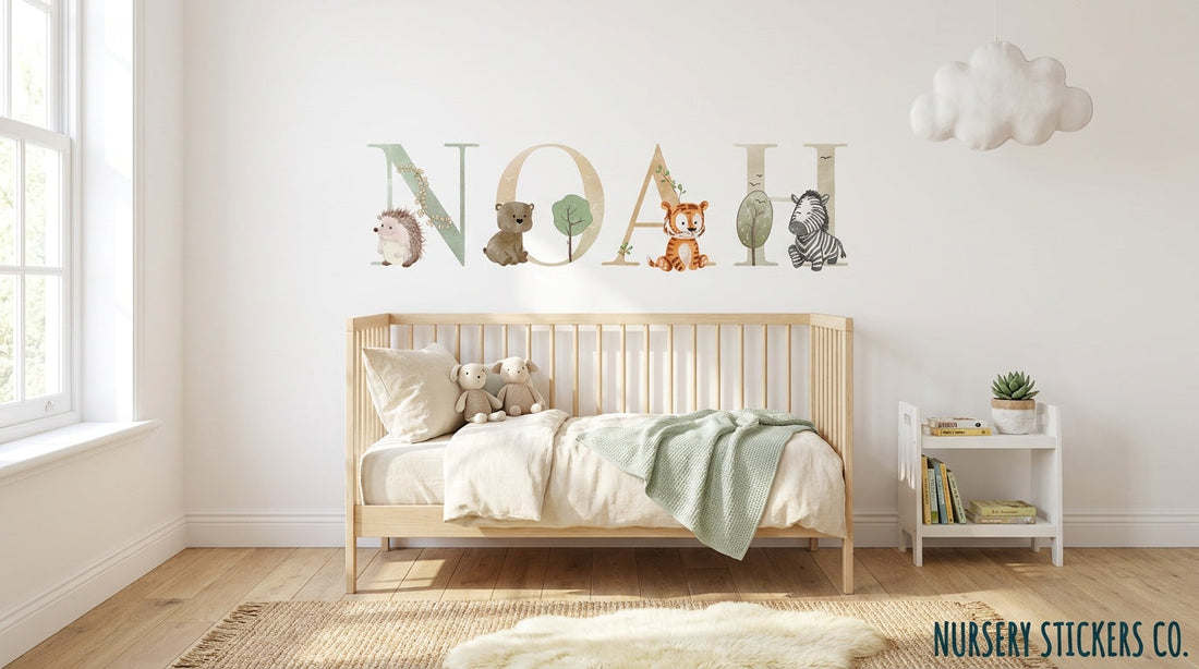 name stickers above cot