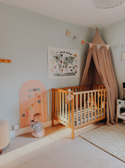 Close-up of child-friendly magnetic arch chalkboard wall sticker in a joyful nursery setting, easy to reposition