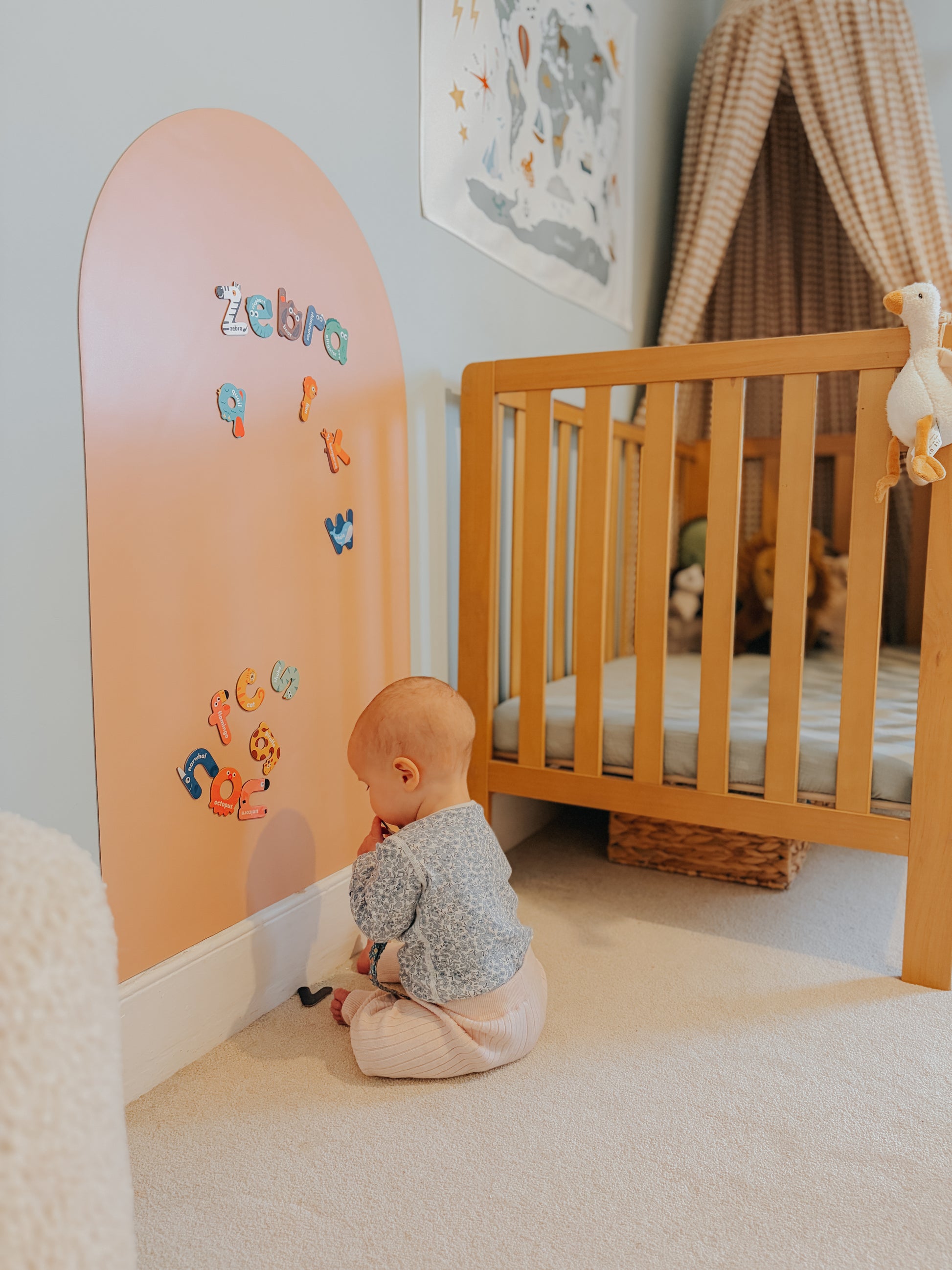 Bright nursery space with magnetic chalkboard wall sticker, encouraging kids to write, draw, and imagine freely