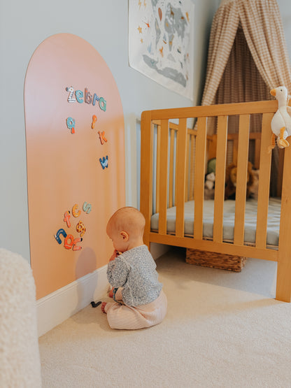 Bright nursery space with magnetic chalkboard wall sticker, encouraging kids to write, draw, and imagine freely