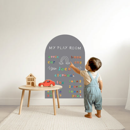 Bright nursery wall featuring magnetic arch chalkboard sticker from Nursery Stickers, designed for easy peel and stick fun